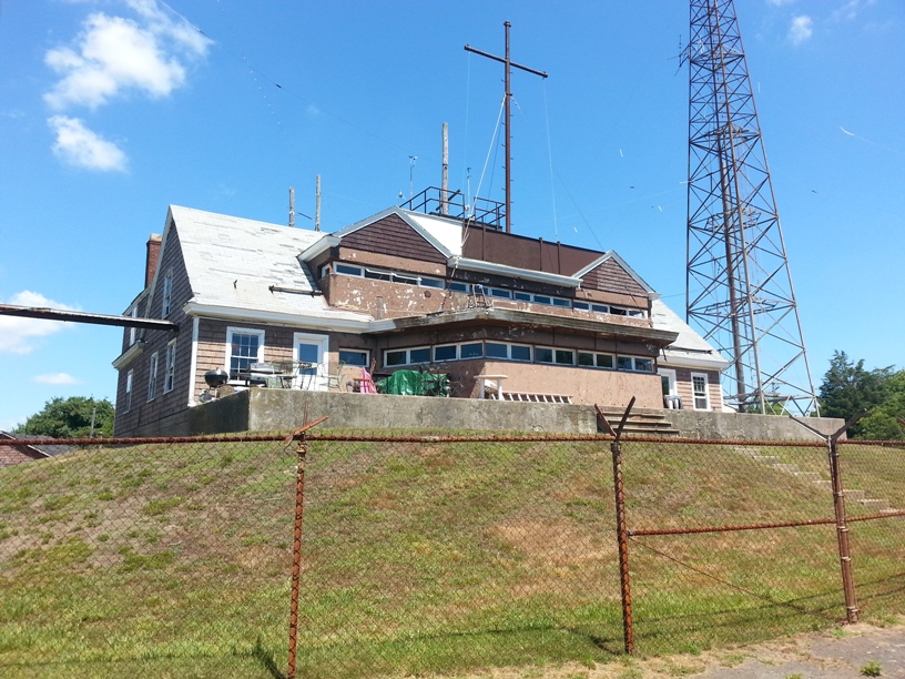 The former Fort Burnside Harbor Entrance Control Post disguised as a mansion at Beavertail State Park